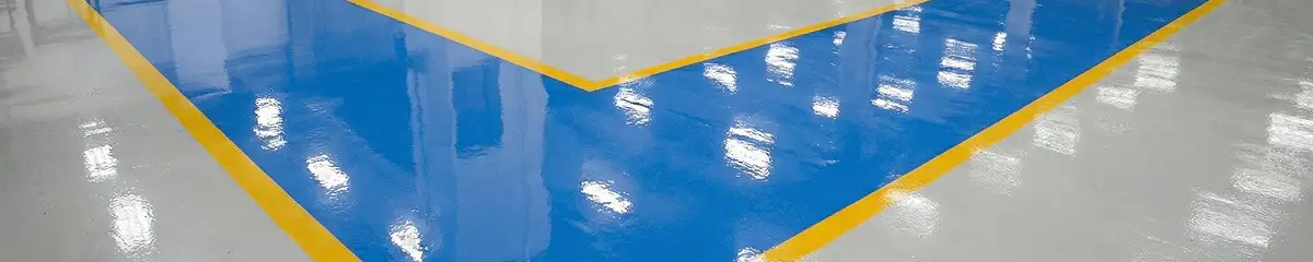 A factory floor professionally covered and marked with epoxy flooring in Chula Vista, CA