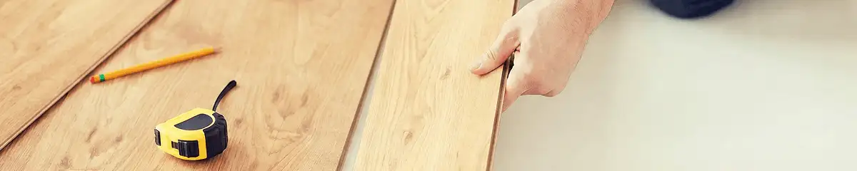 A professional installing wood flooring in Chula Vista, CA
