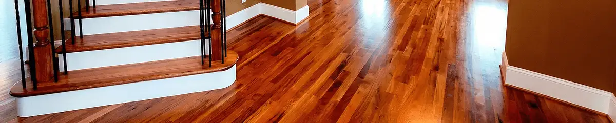 Base floor of a staircase with professionally restored wood flooring in Chula Vista CA