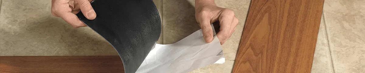 A professional installing vinyl flooring in Chula Vista, CA