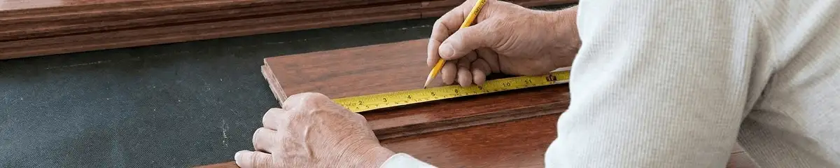 A professional installing wood flooring in Chula Vista, CA
